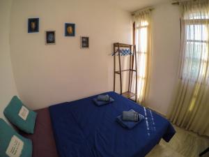 Exodus Hostel & Dive Center客房内的一张或多张床位