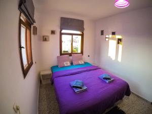 Exodus Hostel & Dive Center客房内的一张或多张床位
