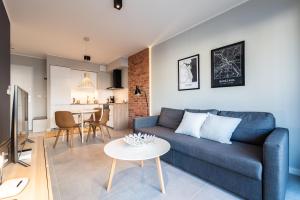 Kuchnia lub aneks kuchenny w obiekcie City Lights Rakowicka 15
