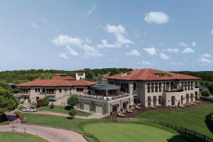 an aerial view of a large house with a green yard at Kemer Country Hotel İstanbul in Istanbul