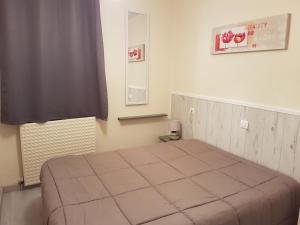Postel nebo postele na pokoji v ubytování Apartamentos Grifo Vacances Grizzly