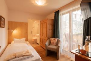 Letto o letti in una camera di Haus Melitta