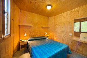 Camping Lido客房内的一张或多张床位