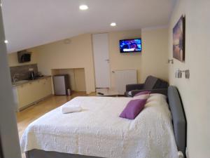 Postel nebo postele na pokoji v ubytování Tukums apartments