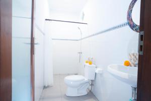 Koupelna v ubytování Suntari Homestay