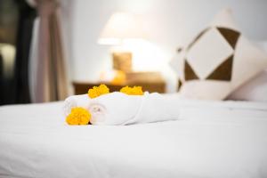 Suntari Homestay客房内的一张或多张床位
