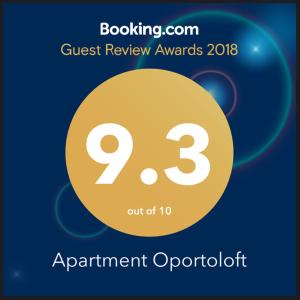 a sign that says guest review awards with a yellow circle at Apartment Oportoloft in Porto