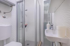 Kúpeľňa v ubytovaní Booba Rooms