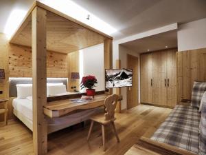 Voodi või voodid majutusasutuse Hotel Bertelli toas