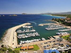 an aerial view of a marina with boats in the water at Attico Bellavista in Santa Maria Navarrese