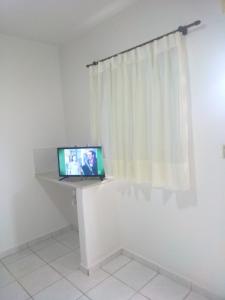 TV i/ili multimedijalni sistem u objektu Hostel Pigally