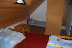 Cama o camas de una habitación en Kuća za odmor JAVOR Vlašić