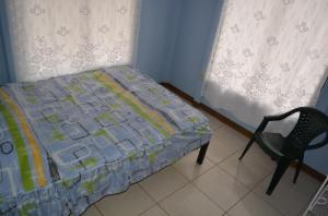 En eller flere senge i et værelse på Finca Eco-amigable La Amistad