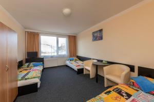 Postel nebo postele na pokoji v ubytování Hotel Buly