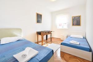 Posteľ alebo postele v izbe v ubytovaní Villa Joy- Paradise near Split + 27 fotografií