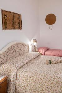 Postel nebo postele na pokoji v ubytování B&B OTIUM