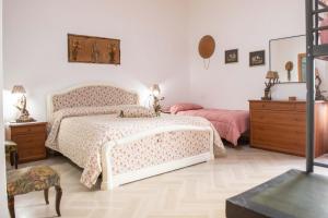 Postel nebo postele na pokoji v ubytování B&B OTIUM