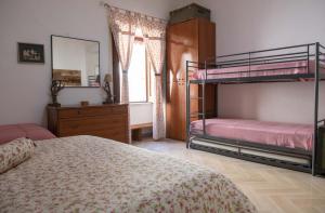 Postel nebo postele na pokoji v ubytování B&B OTIUM