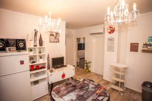 Kuchyň nebo kuchyňský kout v ubytování Apartment Stella