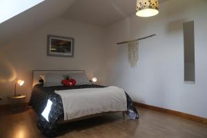 Postel nebo postele na pokoji v ubytování Gîte Cocantin