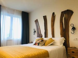 Postel nebo postele na pokoji v ubytování Hotel rural Finca Vivaldi Nature & Spa