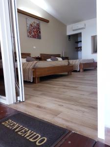 Postel nebo postele na pokoji v ubytování Cahuita Inn