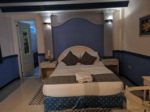 Giường trong phòng chung tại SM Travelodge