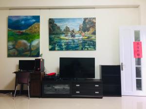 Televiisor ja/või meelelahutuskeskus majutusasutuses Jun Le Bed and Breakfast