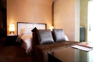 Ένα ή περισσότερα κρεβάτια σε δωμάτιο στο I DO Motel