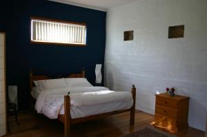 Cherry Top Farmstay - Boutique Eco Village客房内的一张或多张床位