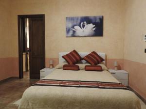 Postel nebo postele na pokoji v ubytování alloggio turistico confortevole Passo Corese