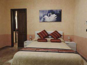 A bed or beds in a room at alloggio turistico confortevole Passo Corese
