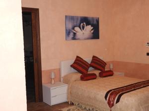 Alloggio Turistico Confortevole Passo Corese客房内的一张或多张床位