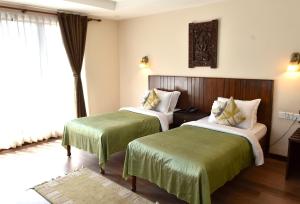 Cama ou camas em um quarto em Hotel Excelsior