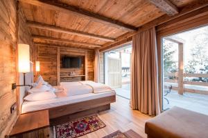 Postel nebo postele na pokoji v ubytování Charmehotel Uhrerhof - Deur + 37 fotografií
