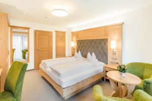 Łóżko lub łóżka w pokoju w obiekcie Hotel Pension Sonnleiten
