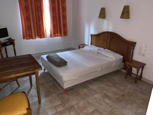 Postel nebo postele na pokoji v ubytování Apart'Hôtel Les 4 Sources
