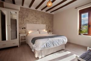 Postel nebo postele na pokoji v ubytování Nasilvana Hotel & Spa Adults Only
