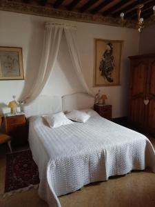 Ein Bett oder Betten in einem Zimmer der Unterkunft I Palazzi B&B