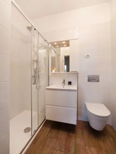a bathroom with a toilet and a sink and a shower at Apartment Villa Lidija in Lovran +37 photos