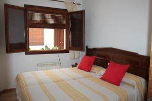 Krevet ili kreveti u jedinici u objektu Apartamentos Rurales Rosendo: La Madre Selva