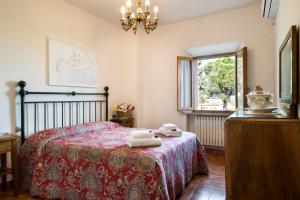 Postel nebo postele na pokoji v ubytování B&B San Gimignano Diffuso