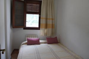 Posteľ alebo postele v izbe v ubytovaní Apartamentos Rurales Rosendo: La Albahaca