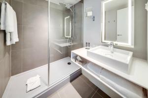 Ванная комната в Novotel Sharjah Expo Centre