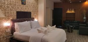 Postel nebo postele na pokoji v ubytování Creek Hotel - Panaji + 7 fotografií