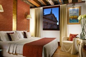 Postel nebo postele na pokoji v ubytování Hotel Palazzo Giovanelli e Gran Canal