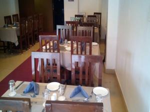 Restaurace v ubytování Creek Hotel - Panaji