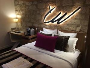 Postel nebo postele na pokoji v ubytování Select Hotel