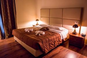 Postel nebo postele na pokoji v ubytování Umbriaverde Sporting & Resort