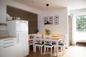 Køkken eller tekøkken på Welcome in - Appartement met dakterras nabij skipiste